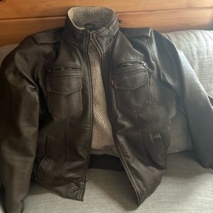 I have a medium Levi’s brown faux leather jacket that is lined.